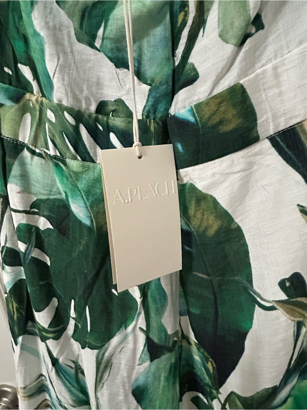 A. Peach Tropical Leaf Halter Wide Leg Jumpsuit with Pockets - Picture 8 of 11